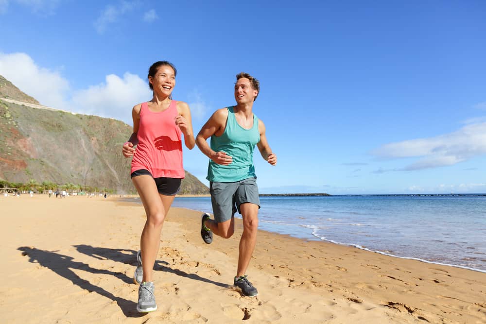 Regenerative Medicine and Couple Running on Beach